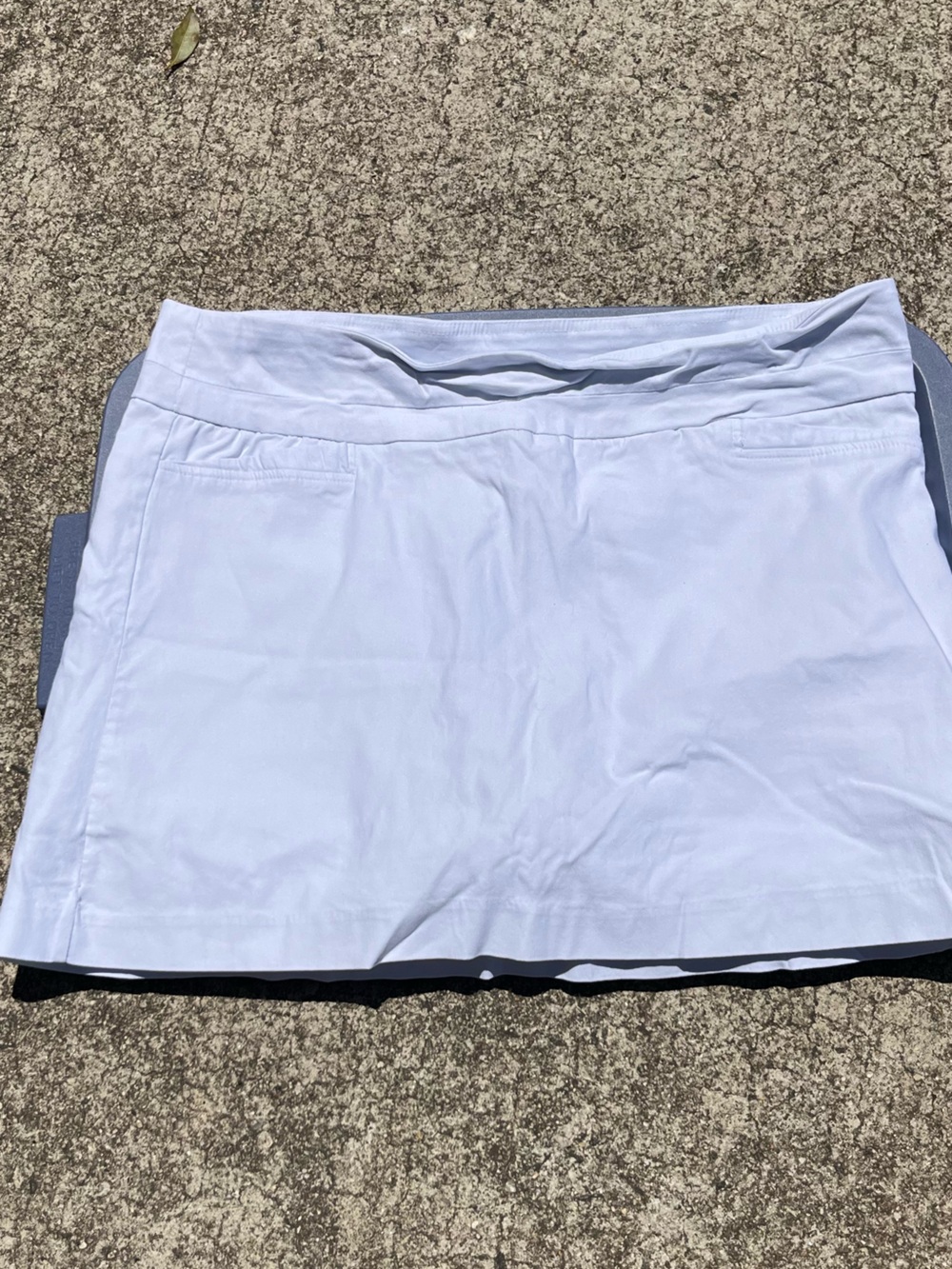 New Directions white mini skirt with shorts underneath